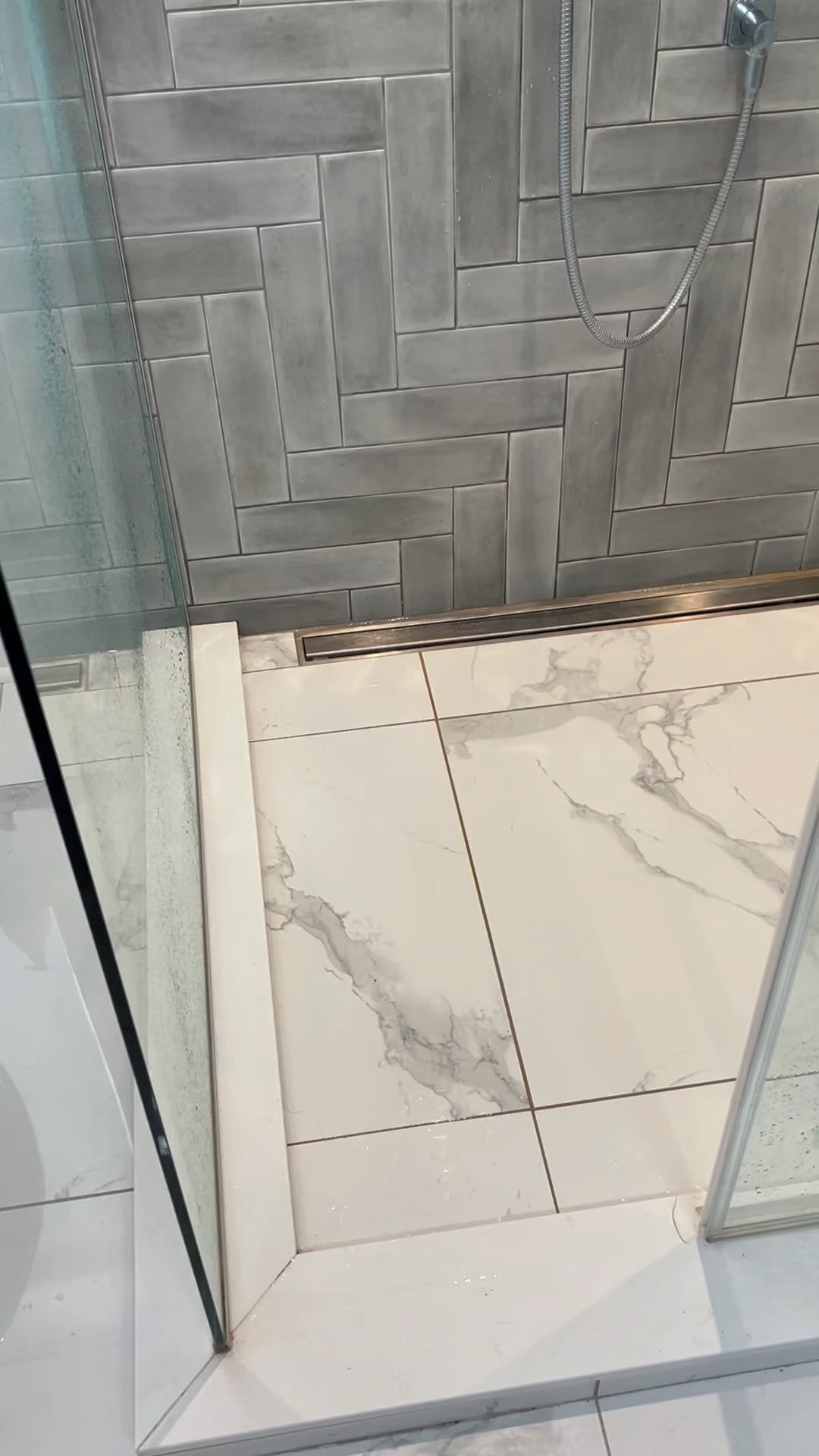 Freshly cleaned marble tile shower